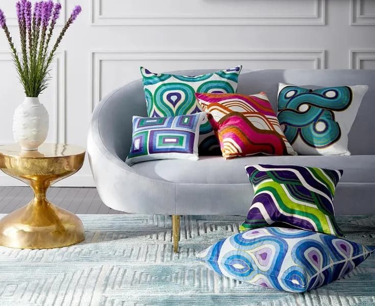 Cover image for the article "Pillow Power! How Throws and Pillows Elevate Your Home"